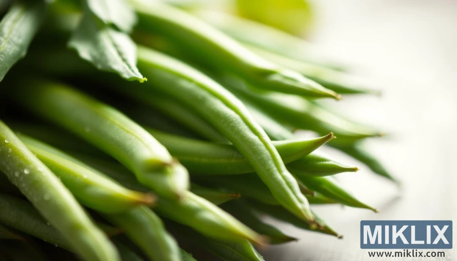 Close-up of vibrant green beans with detailed texture under soft natural light.